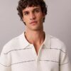 Camisa polo de malha às riscas em algodão Camisa polo de malha às riscas em algodão