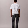 Camisa polo de malha às riscas em algodão Camisa polo de malha às riscas em algodão