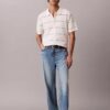 Camisa polo de malha às riscas em algodão Camisa polo de malha às riscas em algodão