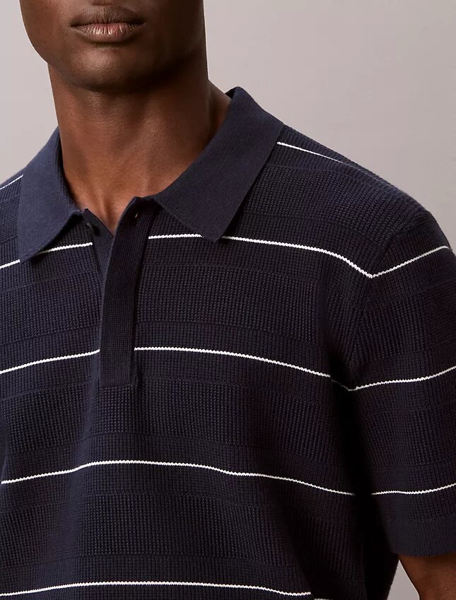 Camisa polo de malha às riscas em algodão Camisa polo de malha às riscas em algodão