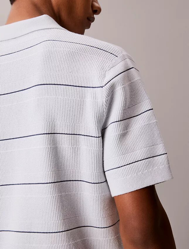 Camisa polo de malha às riscas em algodão Camisa polo de malha às riscas em algodão