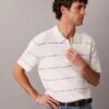 Camisa polo de malha às riscas em algodão Camisa polo de malha às riscas em algodão