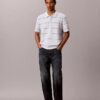 Camisa polo de malha às riscas em algodão Camisa polo de malha às riscas em algodão