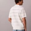 Camisa polo de malha às riscas em algodão Camisa polo de malha às riscas em algodão