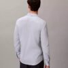 Camisa Slim com botões e padrão jacquard geométrico Camisa Slim com botões e padrão jacquard geométrico
