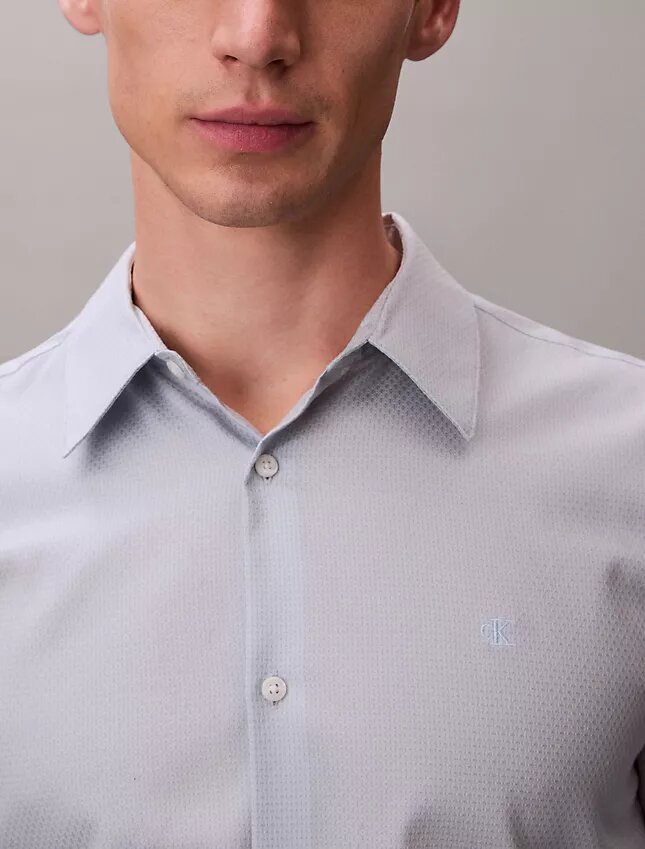 Camisa Slim com botões e padrão jacquard geométrico Camisa Slim com botões e padrão jacquard geométrico