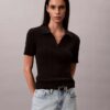 Camiseta polo de malha de algodão lisa Camiseta polo de malha de algodão lisa
