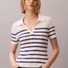 Camiseta polo de malha de algodão lisa Camiseta polo de malha de algodão lisa