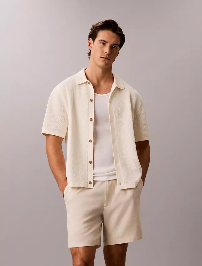 Camisola com botões e ponto em malha Camisola com botões e ponto em malha