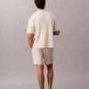 Camisola com botões e ponto em malha Camisola com botões e ponto em malha