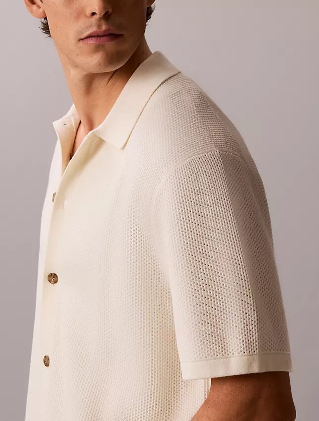 Camisola com botões e ponto em malha Camisola com botões e ponto em malha