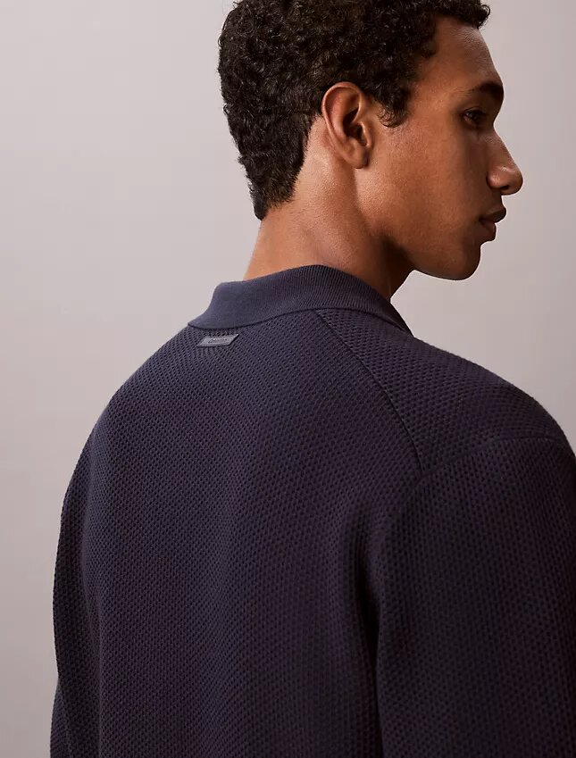 Camisola com botões e ponto em malha Camisola com botões e ponto em malha