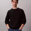 Camisola com canelado e logótipo em todo o tecido Camisola com canelado e logótipo em todo o tecido