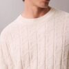 Camisola com canelado e logótipo em todo o tecido Camisola com canelado e logótipo em todo o tecido