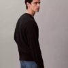 Camisola com canelado e logótipo em todo o tecido Camisola com canelado e logótipo em todo o tecido