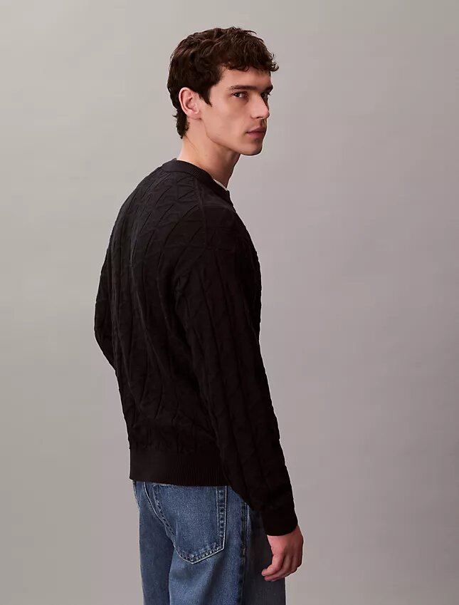 Camisola com canelado e logótipo em todo o tecido Camisola com canelado e logótipo em todo o tecido