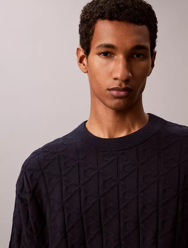 Camisola com canelado e logótipo em todo o tecido Camisola com canelado e logótipo em todo o tecido