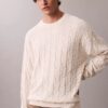 Camisola com canelado e logótipo em todo o tecido Camisola com canelado e logótipo em todo o tecido
