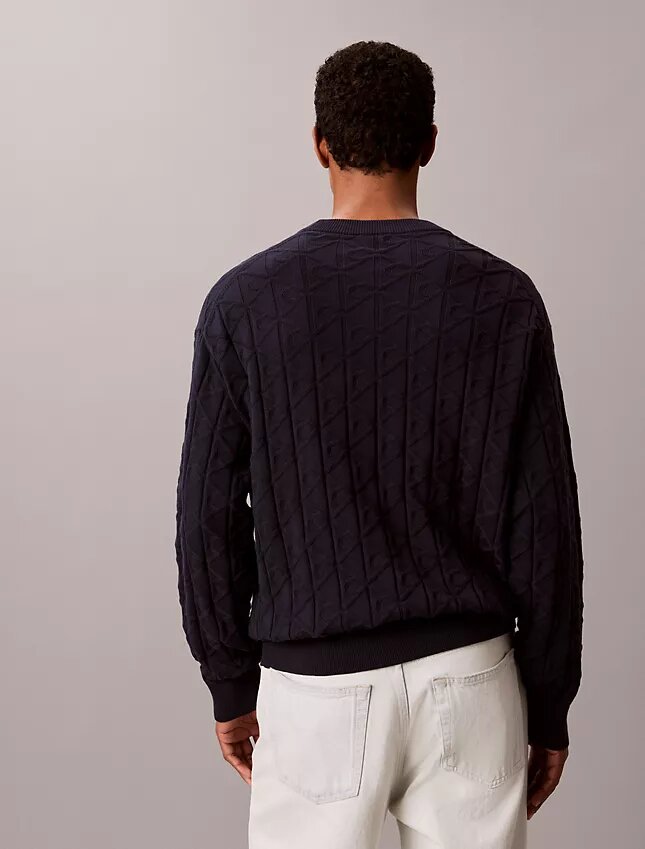 Camisola com canelado e logótipo em todo o tecido Camisola com canelado e logótipo em todo o tecido