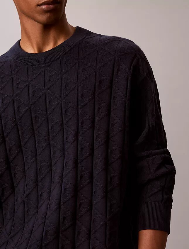 Camisola com canelado e logótipo em todo o tecido Camisola com canelado e logótipo em todo o tecido