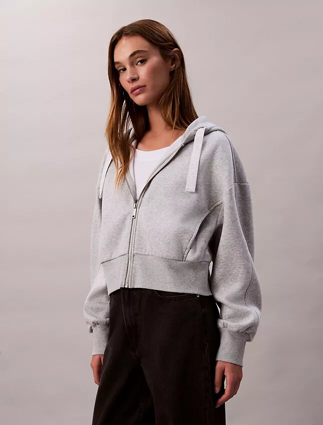 Camisola com capuz descontraída em malha polar com fecho e fita com logótipo Camisola com capuz descontraída em malha polar com fecho e fita com logótipo