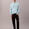 Camisola com capuz em tecido felpudo premium com Monogram e corte descontraído Camisola com capuz em tecido felpudo premium com Monogram e corte descontraído