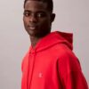 Camisola com capuz em tecido felpudo premium com Monogram e corte descontraído Camisola com capuz em tecido felpudo premium com Monogram e corte descontraído