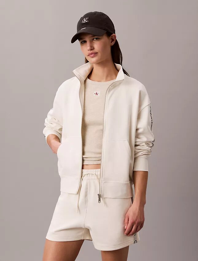 Camisola com fecho completo e fita com logótipo Camisola com fecho completo e fita com logótipo