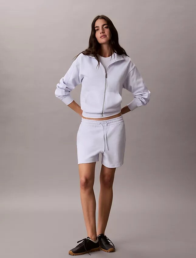 Camisola com fecho completo e fita com logótipo Camisola com fecho completo e fita com logótipo