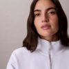 Camisola com fecho completo e fita com logótipo Camisola com fecho completo e fita com logótipo