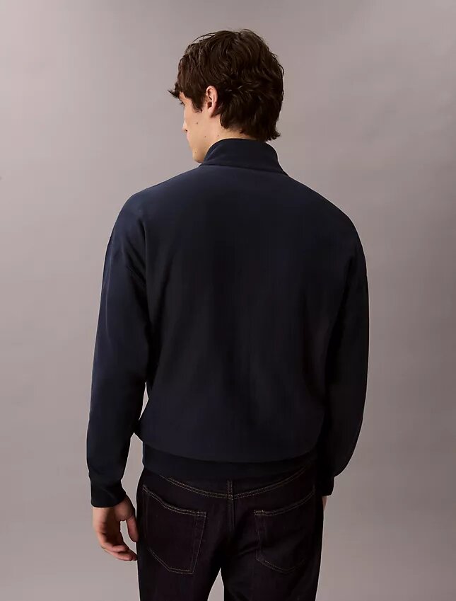 Camisola com fecho de correr de um quarto em tecido felpudo premium Monologo Camisola com fecho de correr de um quarto em tecido felpudo premium Monologo