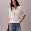 Camisola de malha aberta com gola polo Camisola de malha aberta com gola polo