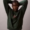 Camisola Descontraída em Tecido Felpudo Premium com Logótipo Monogram Camisola Descontraída em Tecido Felpudo Premium com Logótipo Monogram