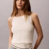 Camisola sem mangas em malha trançada com Monologo tecido Camisola sem mangas em malha trançada com Monologo tecido