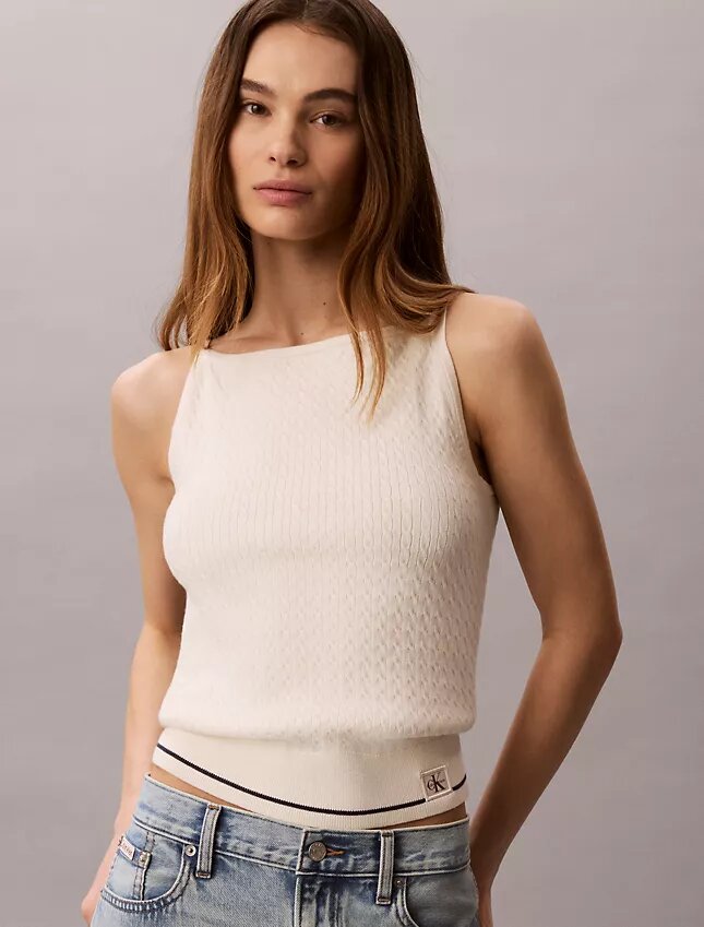 Camisola sem mangas em malha trançada com Monologo tecido Camisola sem mangas em malha trançada com Monologo tecido
