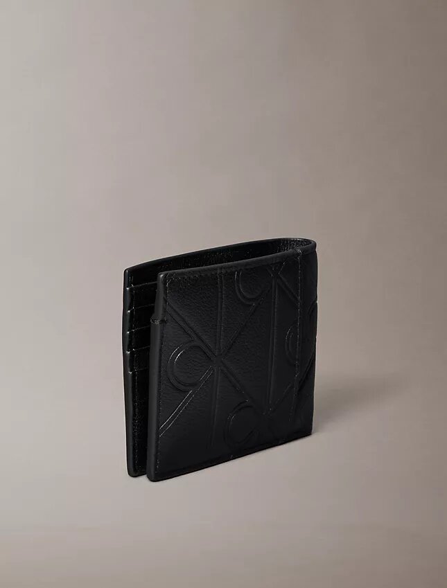 Carteira dobrável com emblema em relevo e bolsa para moedas Carteira dobrável com emblema em relevo e bolsa para moedas