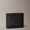 Carteira dobrável com monogram em relevo em toda a superfície e bolsa para moedas Carteira dobrável com monogram em relevo em toda a superfície e bolsa para moedas