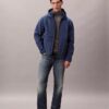 Casaco Softshell com capuz e fecho Casaco Softshell com capuz e fecho