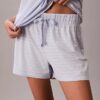 Conjunto de t-shirt e calções em mistura de viscose e algodão Conjunto de t-shirt e calções em mistura de viscose e algodão