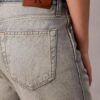 Jeans Bootcut descontraídos com ouropel Jeans Bootcut descontraídos com ouropel