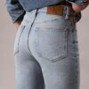 Jeans de cintura alta e corte reto
