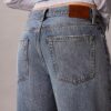 Jeans de ganga largos de cintura baixa Jeans de ganga largos de cintura baixa
