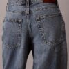Jeans de ganga largos de cintura baixa Jeans de ganga largos de cintura baixa