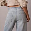 Jeans de ganga largos de cintura baixa com logótipo Jeans de ganga largos de cintura baixa com logótipo
