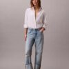 Jeans largos com bainha larga