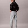 Jeans largos com bainha larga