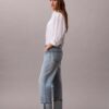 Jeans largos com bainha larga