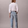 Jeans largos com bainha larga