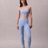 Leggings desportivas modernas de cintura alta com logótipo e comprimento 7/8 Leggings desportivas modernas de cintura alta com logótipo e comprimento 7/8