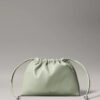 Mala a tiracolo com cordão e Monogram Mala a tiracolo com cordão e Monogram